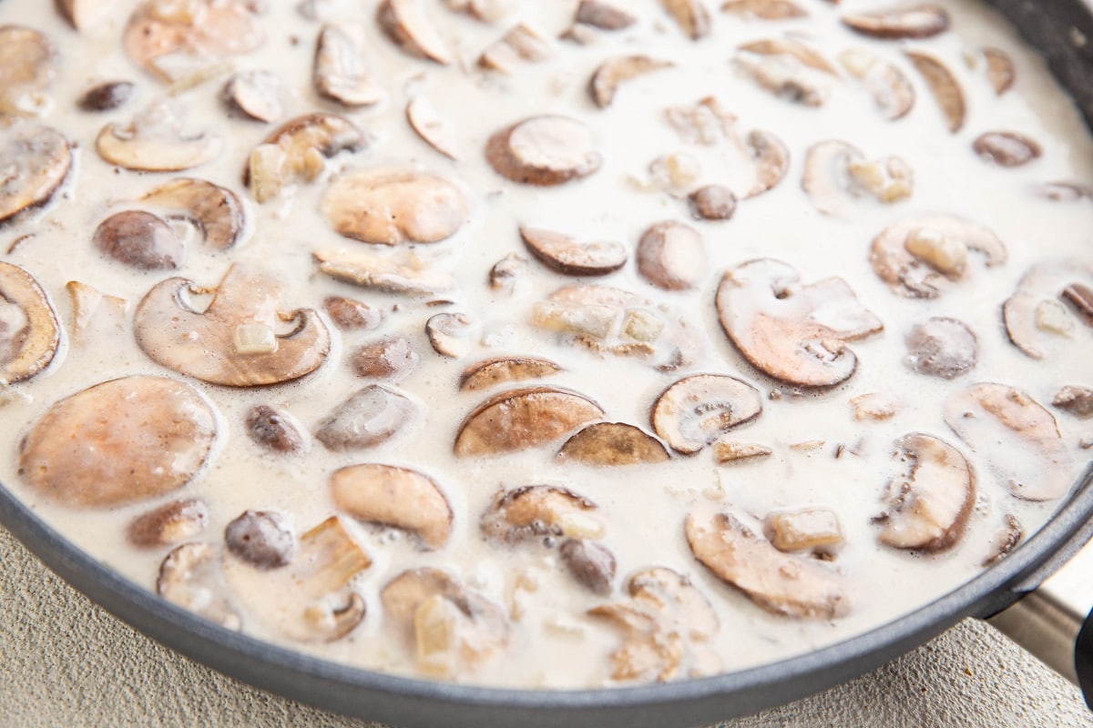 Stroganoff sauce in a skillet.