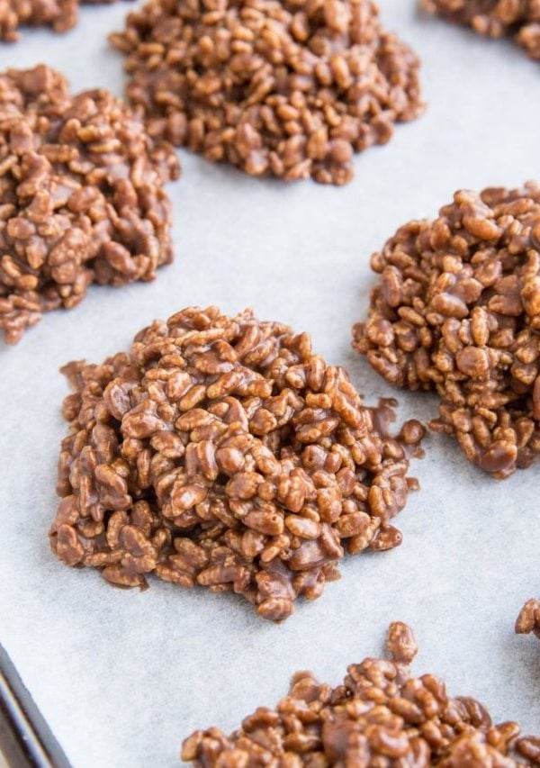 Chocolate peanut butter no bake rice crispy cookies on a baking sheet. Ready to eat!