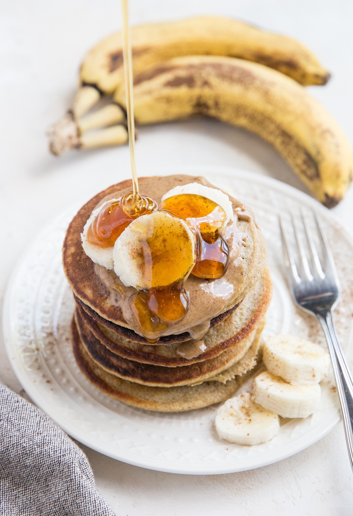 Blender Banana Pancakes made with quick oats for a flourless, gluten-free, dairy-free pancake recipe