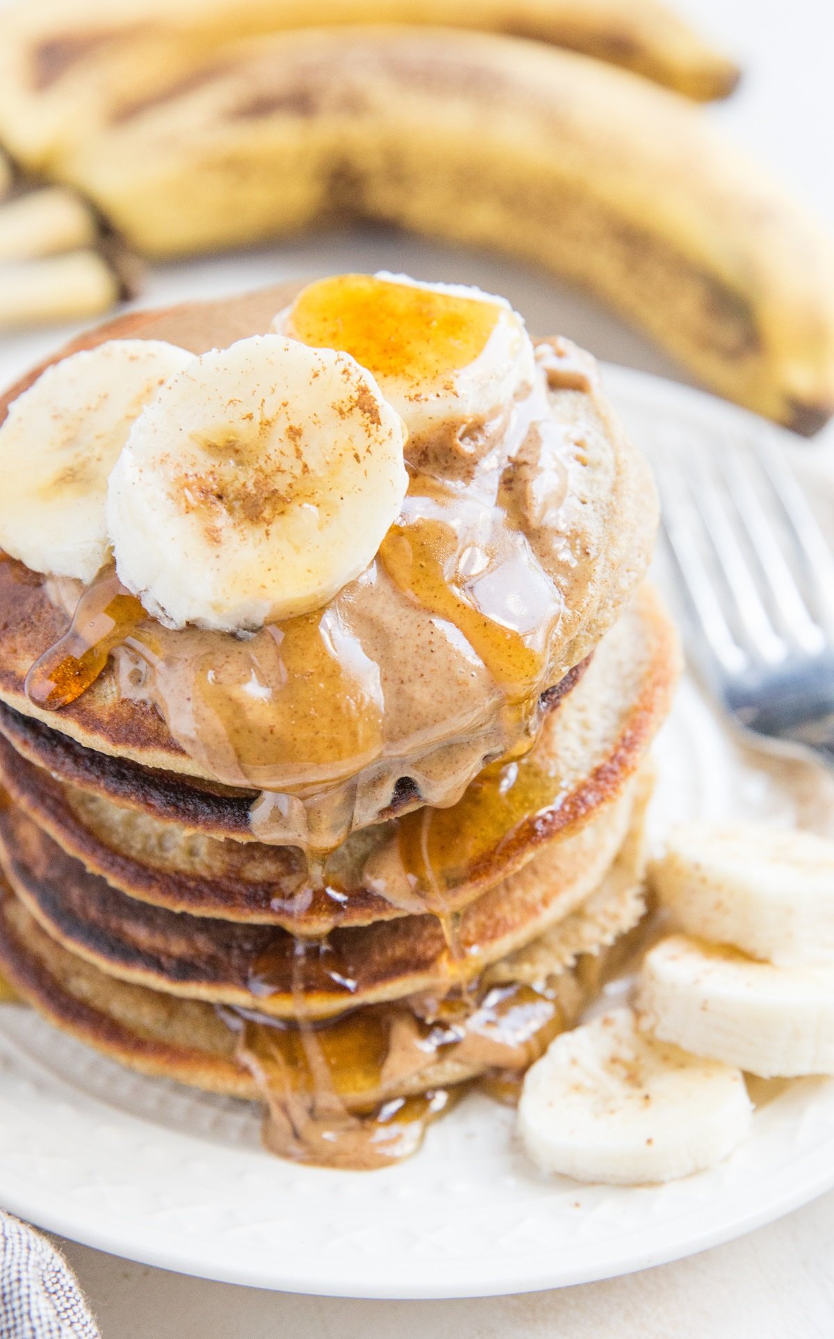 Flourless Oatmeal Banana Pancakes made with only 6 ingredients! These moist, fluffy, sweet and cinnamon pancakes make a delicious healthy gluten-free breakfast and are awesome for serving kids and guests of all ages.