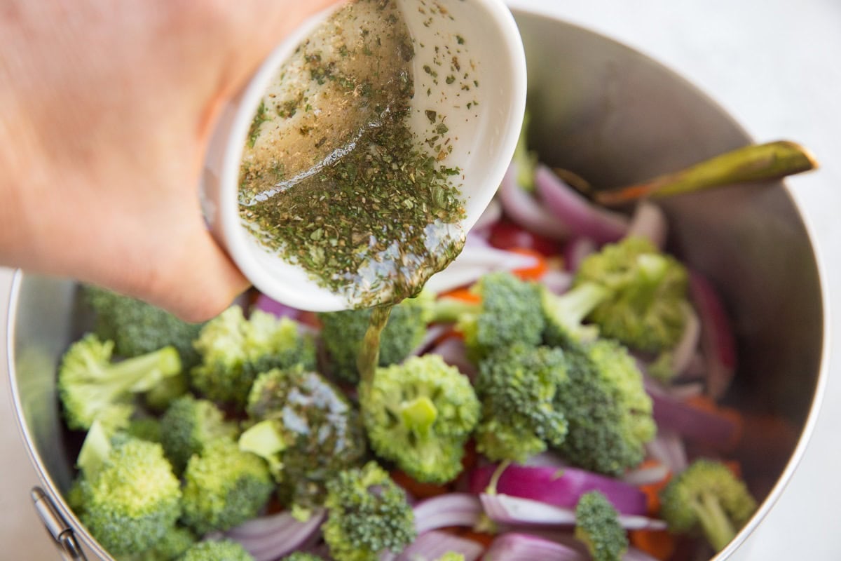 Pour the oil herb mixture over the vegetables