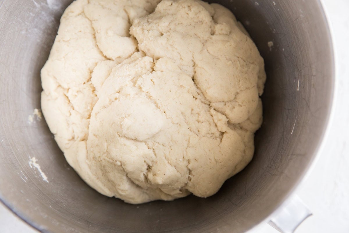 Big ball of dough in a stand mixer to make dinner rolls.