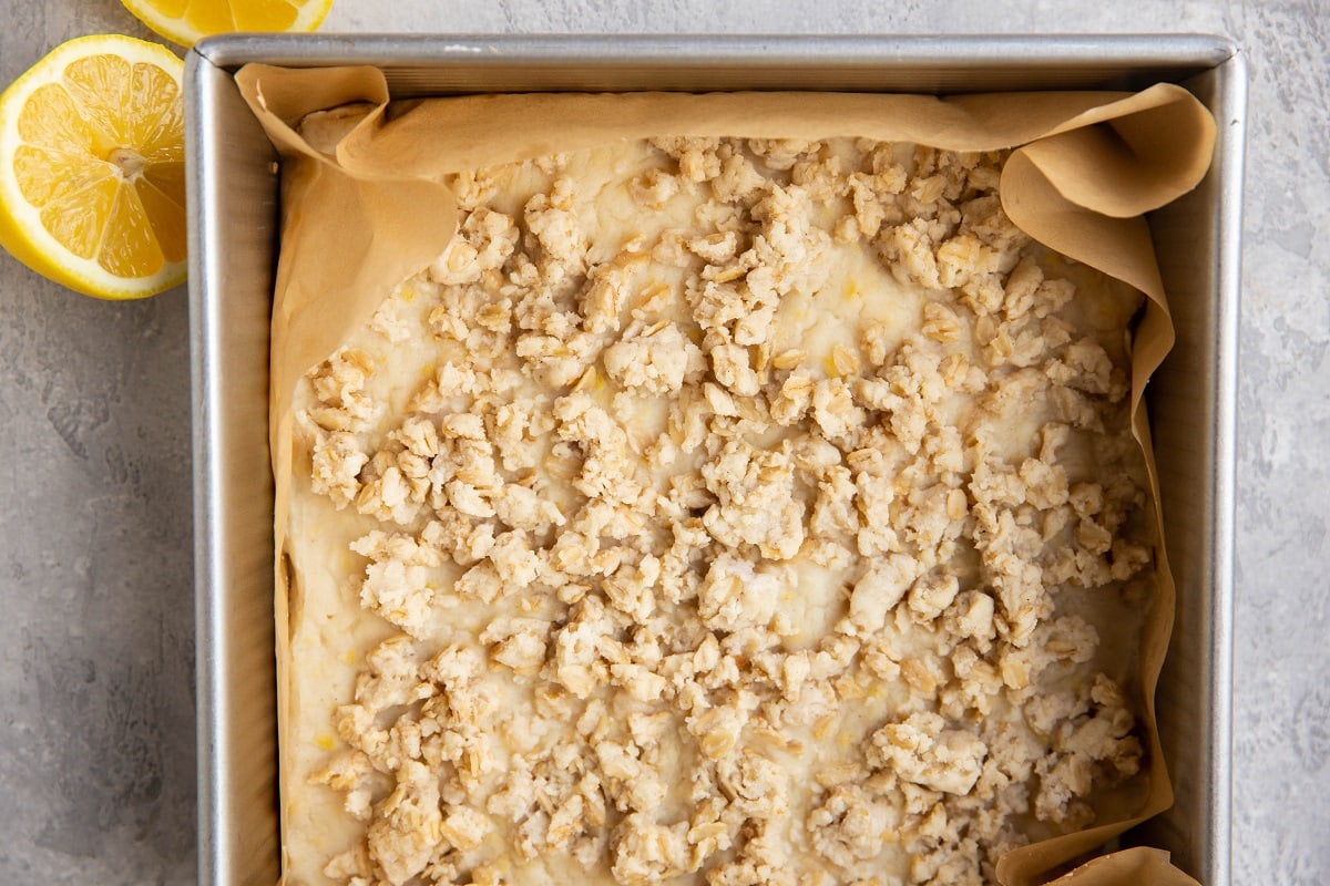 Baking pan with lemon bars inside, fresh out of the oven.