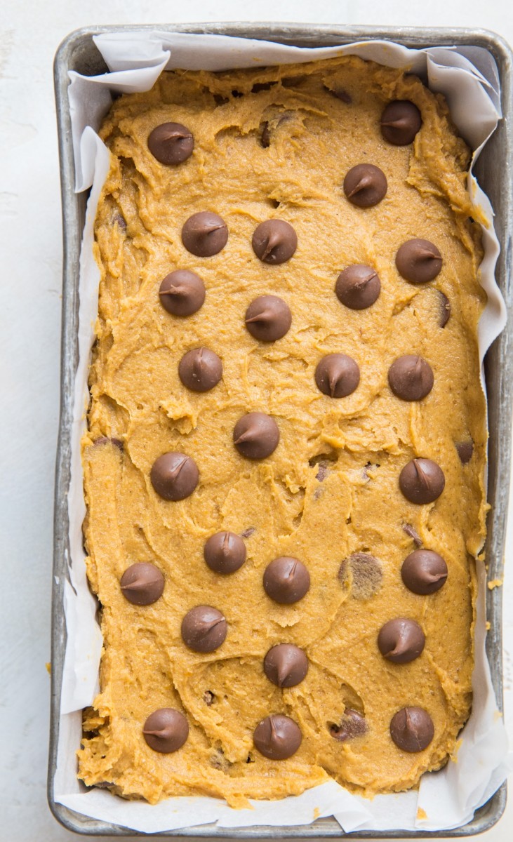 Pumpkin bread batter in a loaf pan, ready to be baked