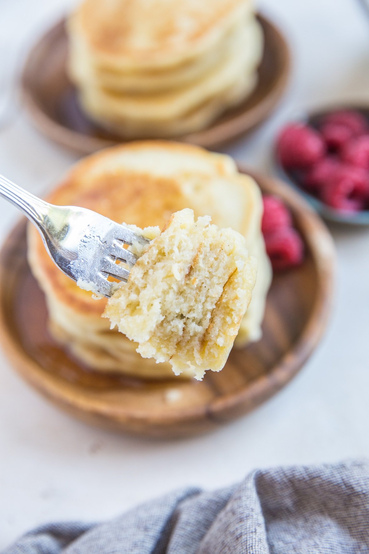 close up photo of bite of fluffy pancakes