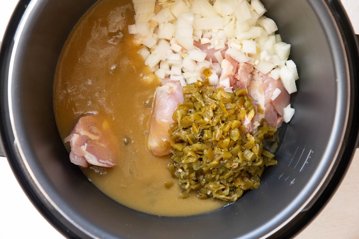 Ingredients for chile verde shredded chicken in an Instant Pot