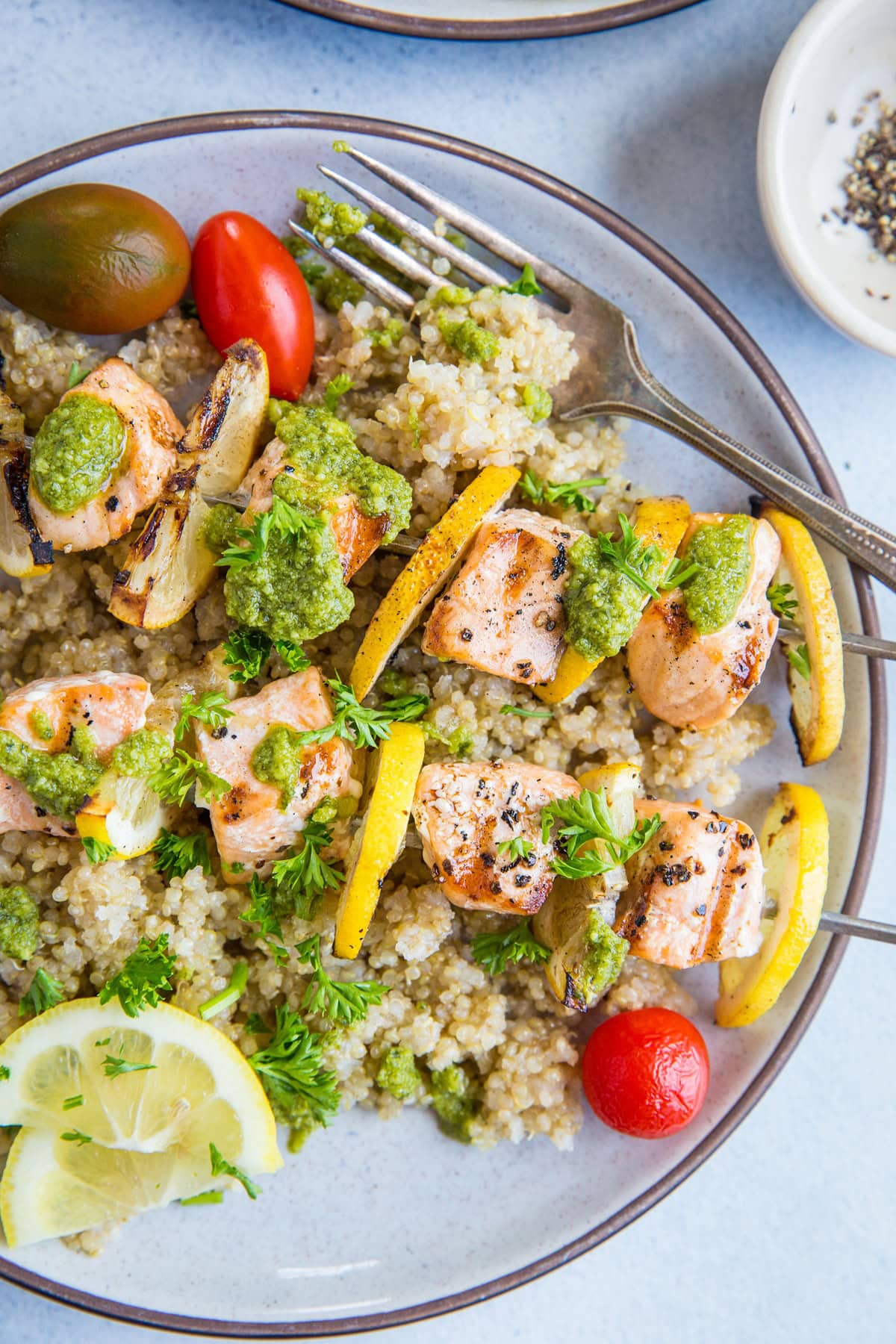 Lemony Grilled Salmon Kabobs with Quinoa and Pesto - a quick, easy, and healthy meal | TheRoastedRoot.com #glutenfree #paleo #primal
