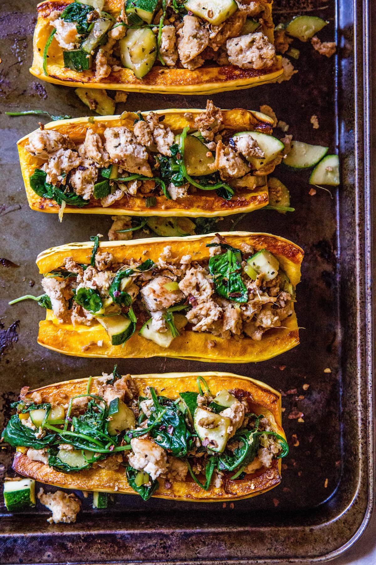 Ground Turkey Stuffed Delicata Squash with zucchini, spinach, ginger, and coconut aminos - paleo, whole30, keto, low-carb, and AIP dinner recipe! | TheRoastedRoot.net