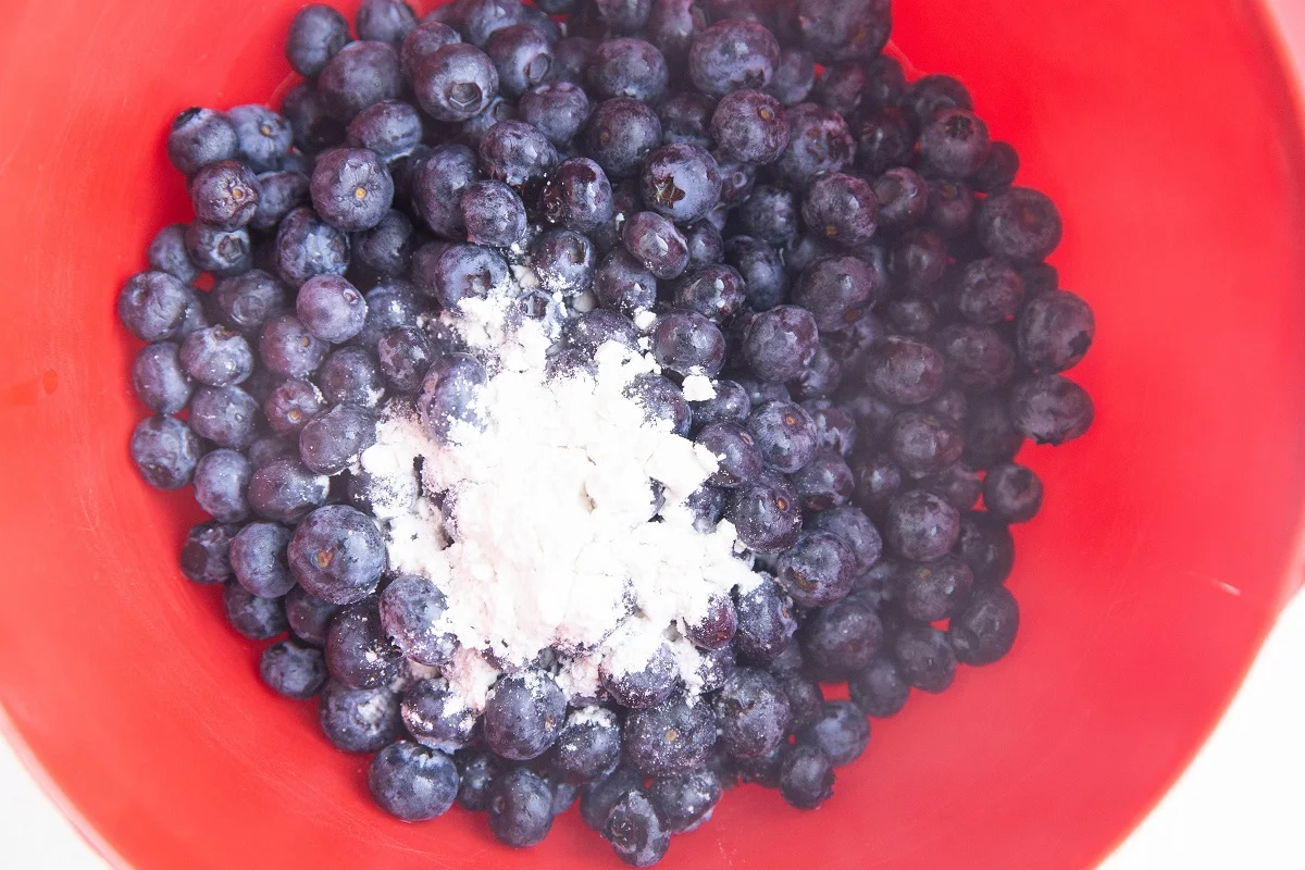 Ingredients for blueberry filling in a mixing bowl.