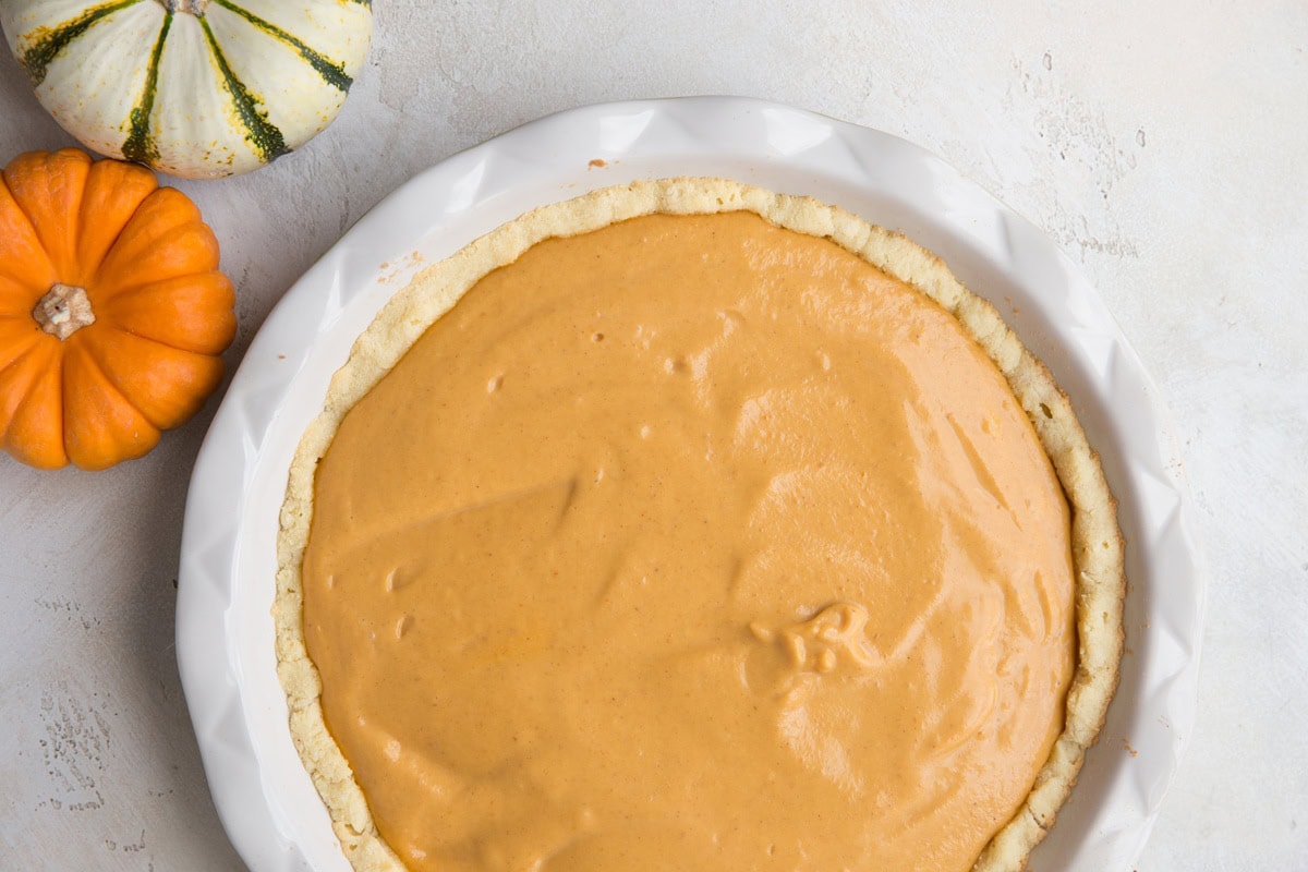 Pumpkin pie ready to go into the oven