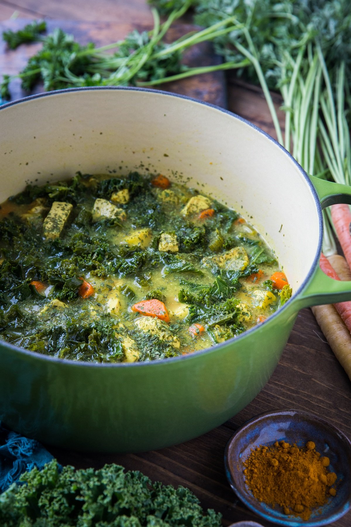 Large pot full of turmeric chicken soup, ready to serve.