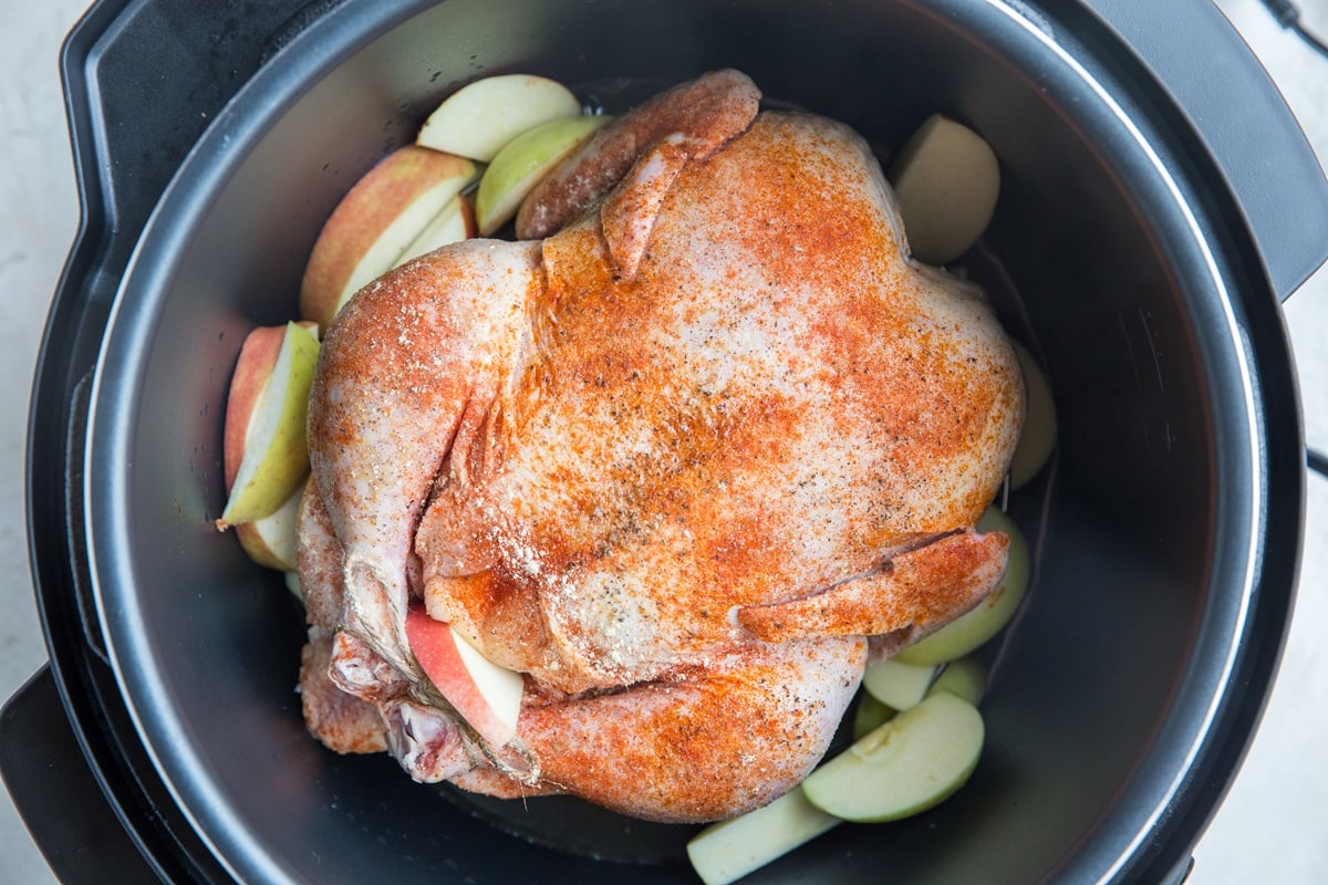 Place the whole chicken on the trivet inside the Instant Pot