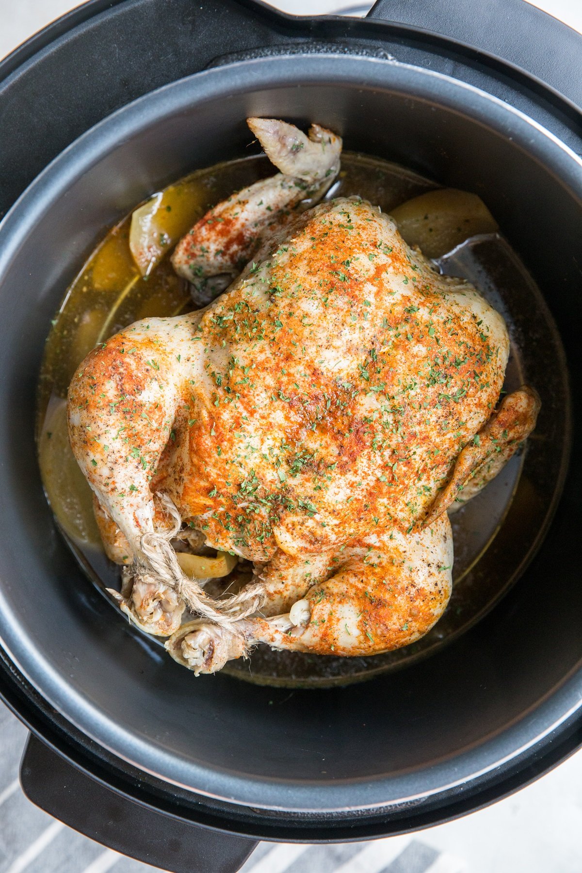 Cooked whole chicken inside an Instant Pot