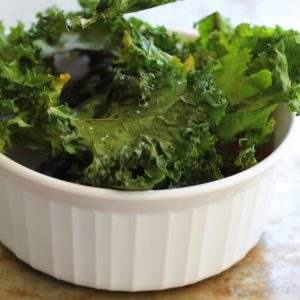 Baked Kale Chips in a ramekin, ready to serve.