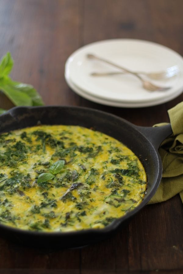 Skillet with a frittata inside.