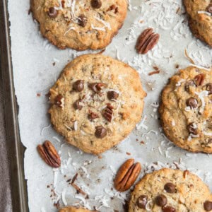 Keto cowboy cookies on a cookie sheet, fresh out of the oven, ready to eat.