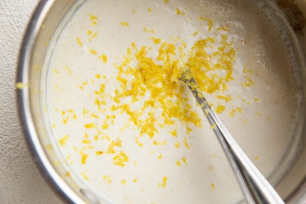 Ingredients for creamy lemon filling in a saucepan.