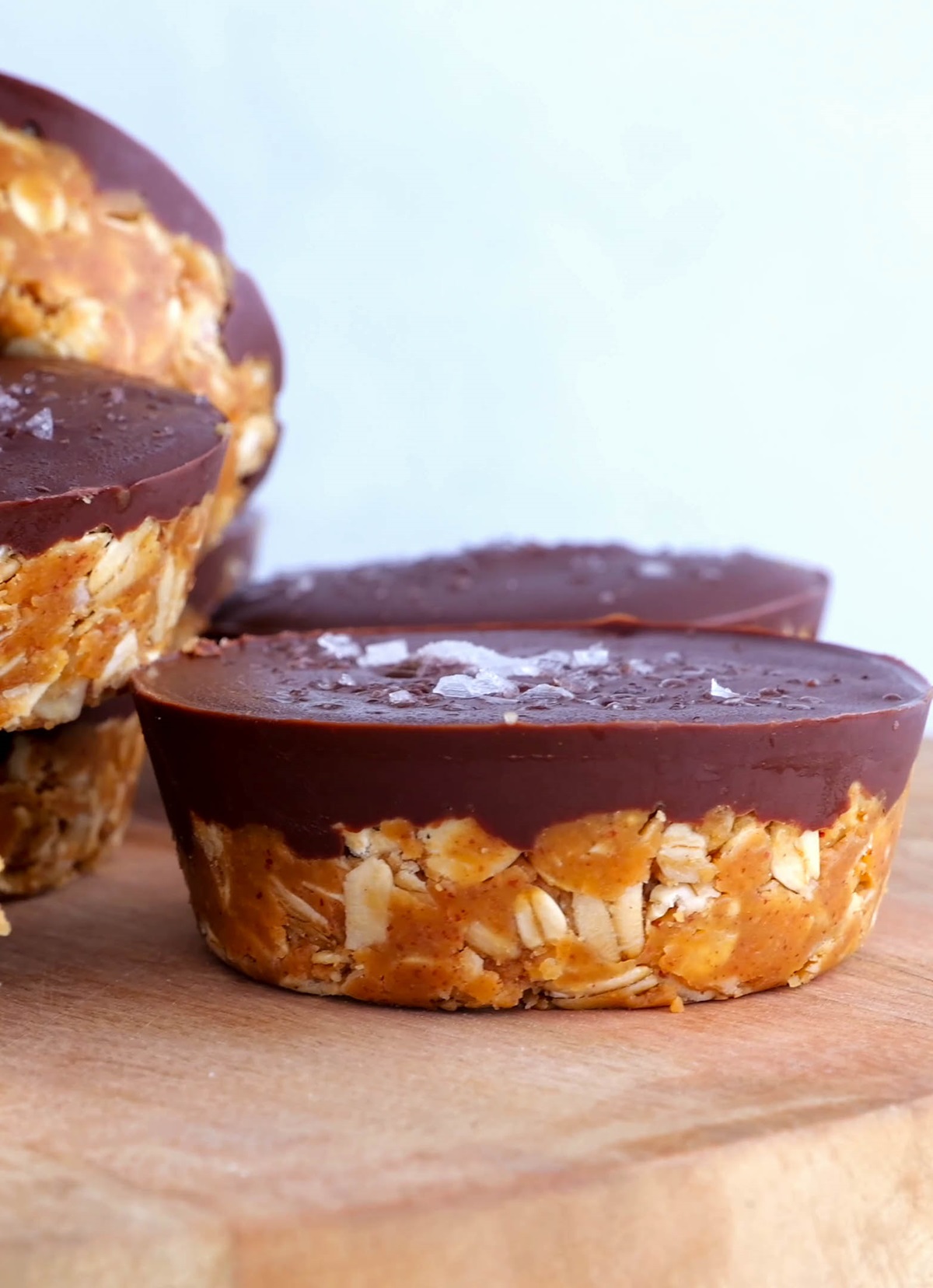 Close up of peanut butter cups with one with a bite taken out.