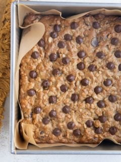 Peanut Butter Oatmeal Chocolate Chip Cookie Bars in a baking dish, fresh out of the oven.