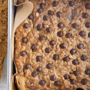 Peanut Butter Oatmeal Chocolate Chip Cookie Bars in a baking dish, fresh out of the oven.