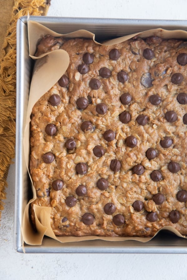 Peanut Butter Oatmeal Chocolate Chip Cookie Bars in a baking dish, fresh out of the oven.