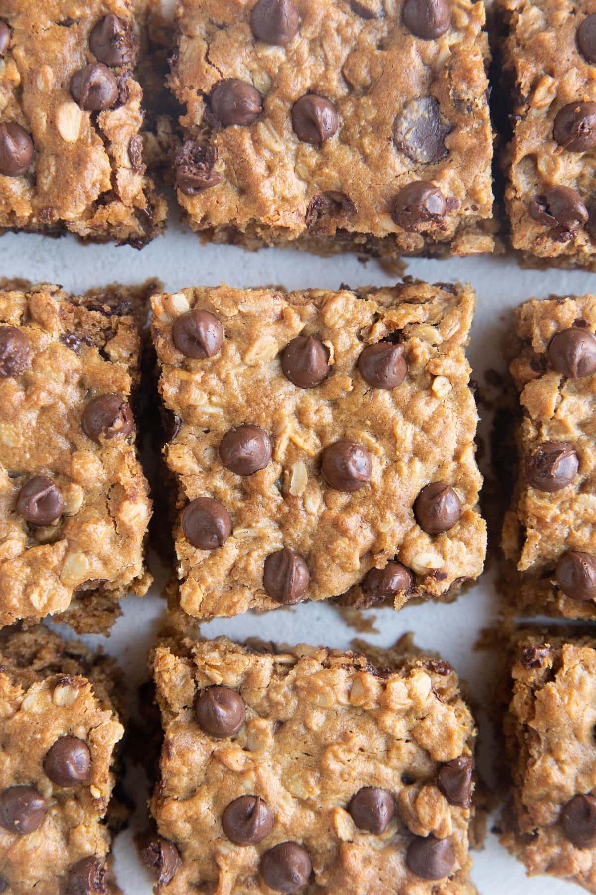 Peanut Butter Cookie Bar squares on a white background.