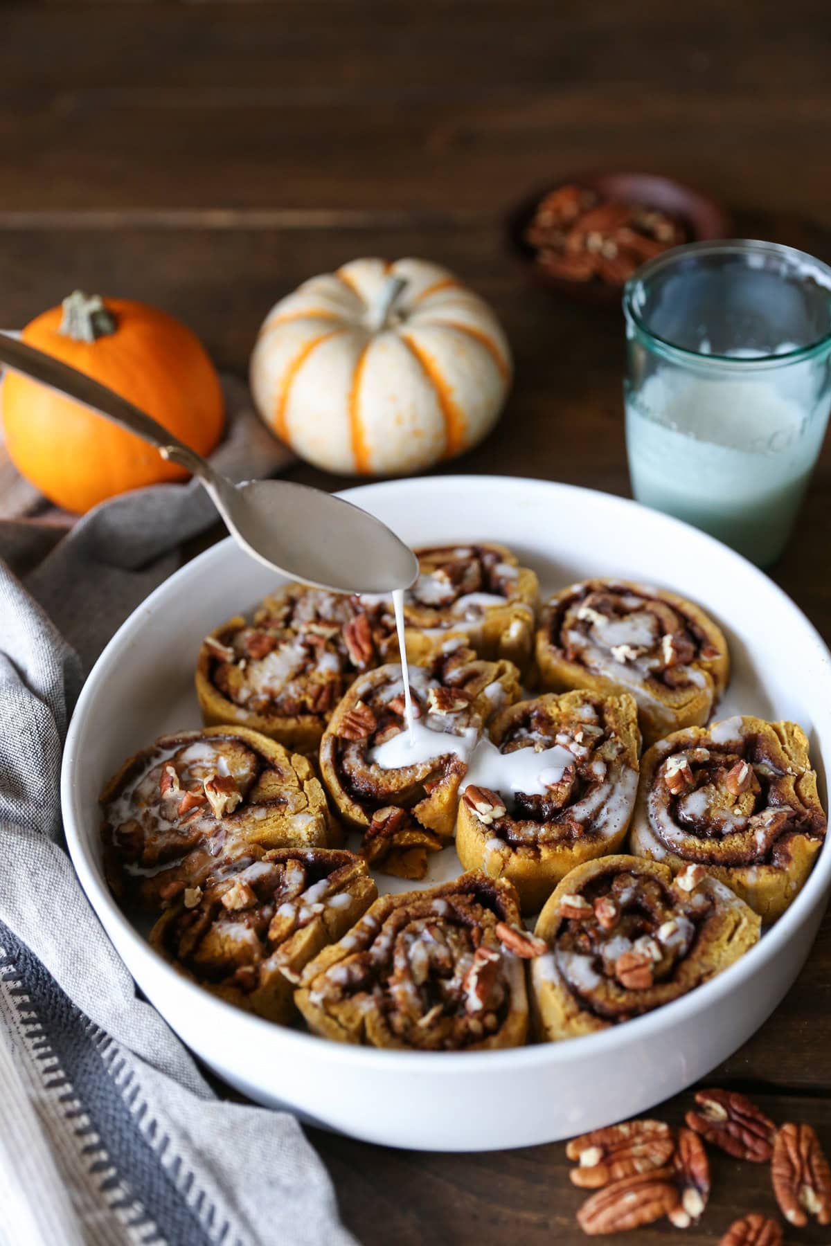 Gluten-Free Pumpkin Cinnamon Rolls with Coconut Milk Glaze - naturally sweetened and dairy-free | TheRoastedRoot.net #healthy #holiday #breakfast #glutenfree