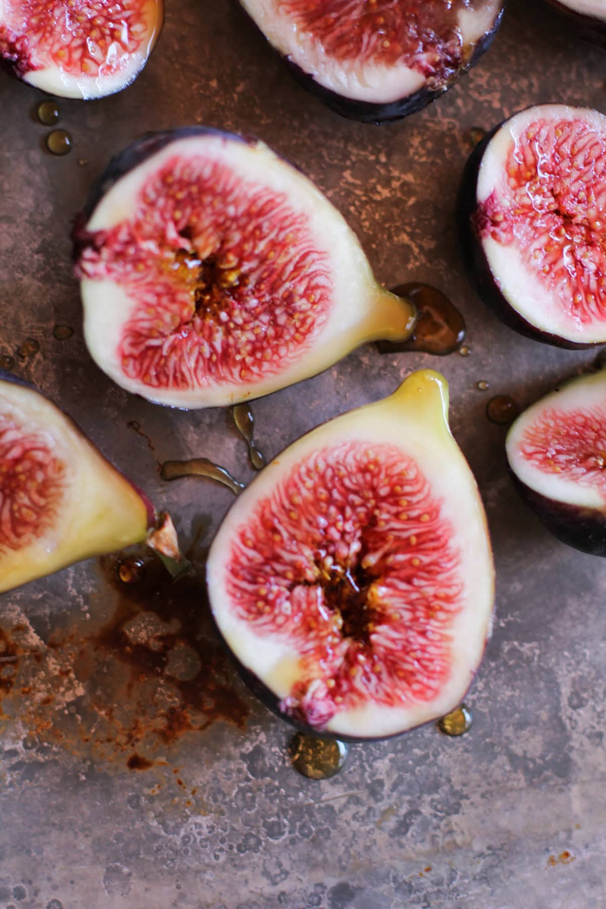Raw figs on a sheet pan drizzled with pure maple syrup