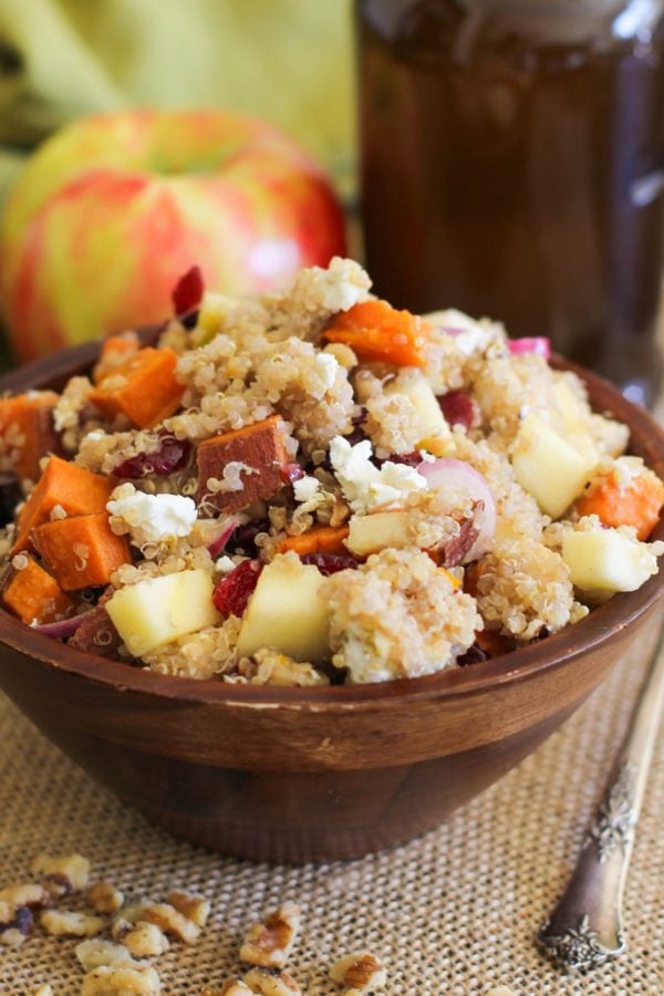 Large wooden bowl full of sweet potato quinoa salad