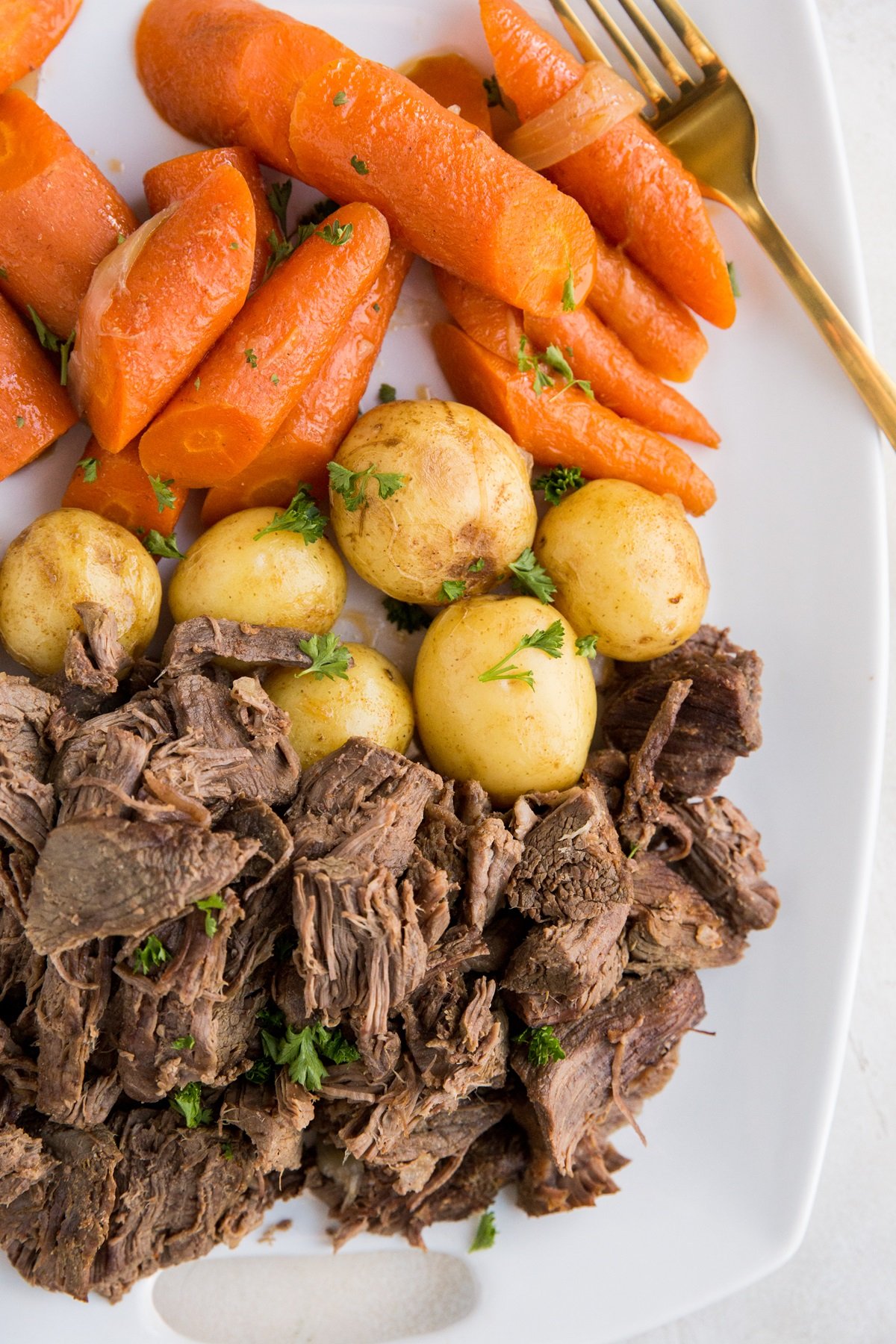 Pot Roast with vegetables on a platter, ready to serve.
