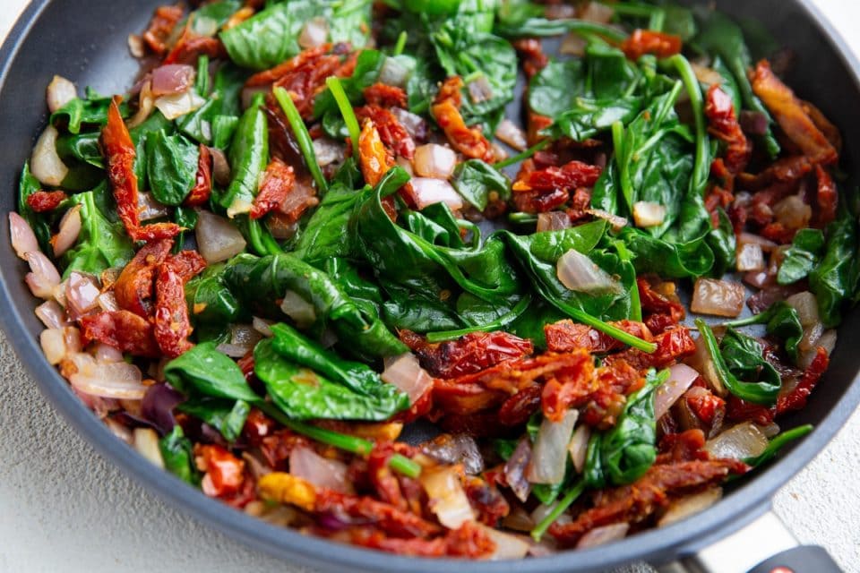 Sun-Dried Tomato and Feta Baked Salmon with Spinach - The Roasted Root