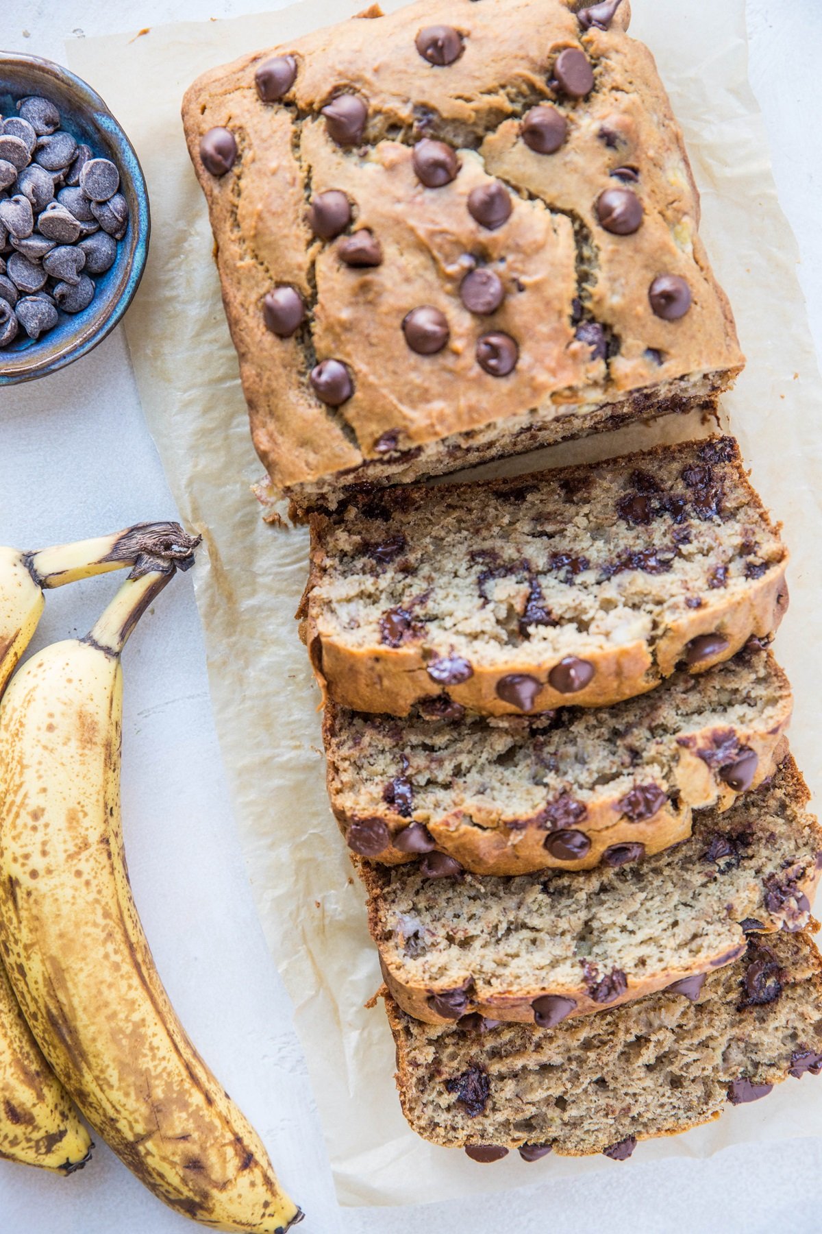 The BEST Moist Gluten-Free Banana Bread sweetened with coconut sugar - a delicious perfectly fluffy chocolate chip banana bread recipe | TheRoastedRoot.net