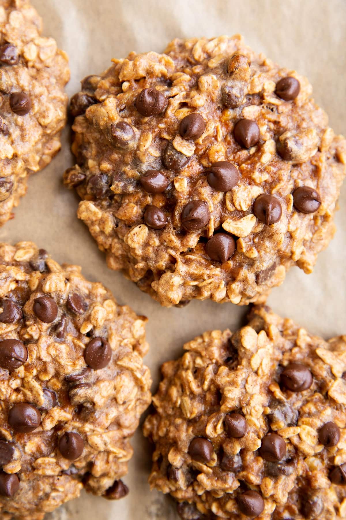 Baking sheet with almond butter oatmeal cookies fresh out of the oven.