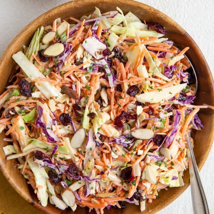 Carrot coleslaw in a large bowl ready to serve.