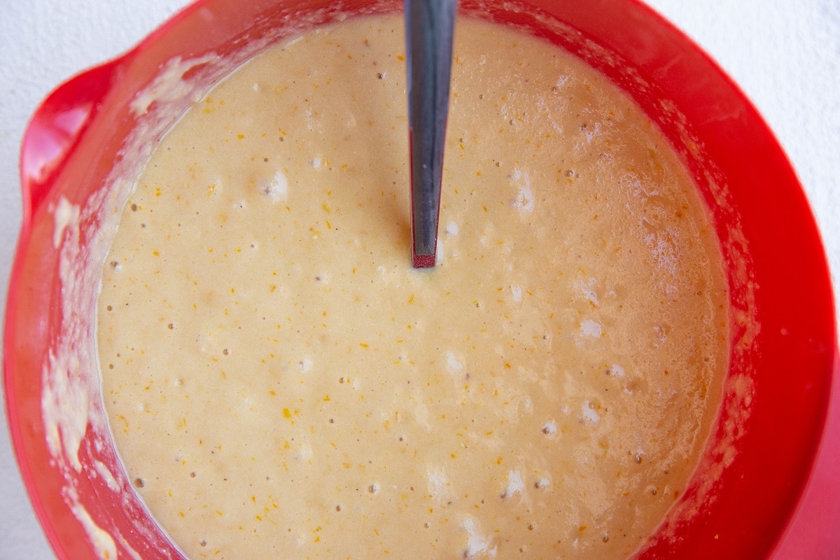 Lemon cake batter in a mixing bowl.