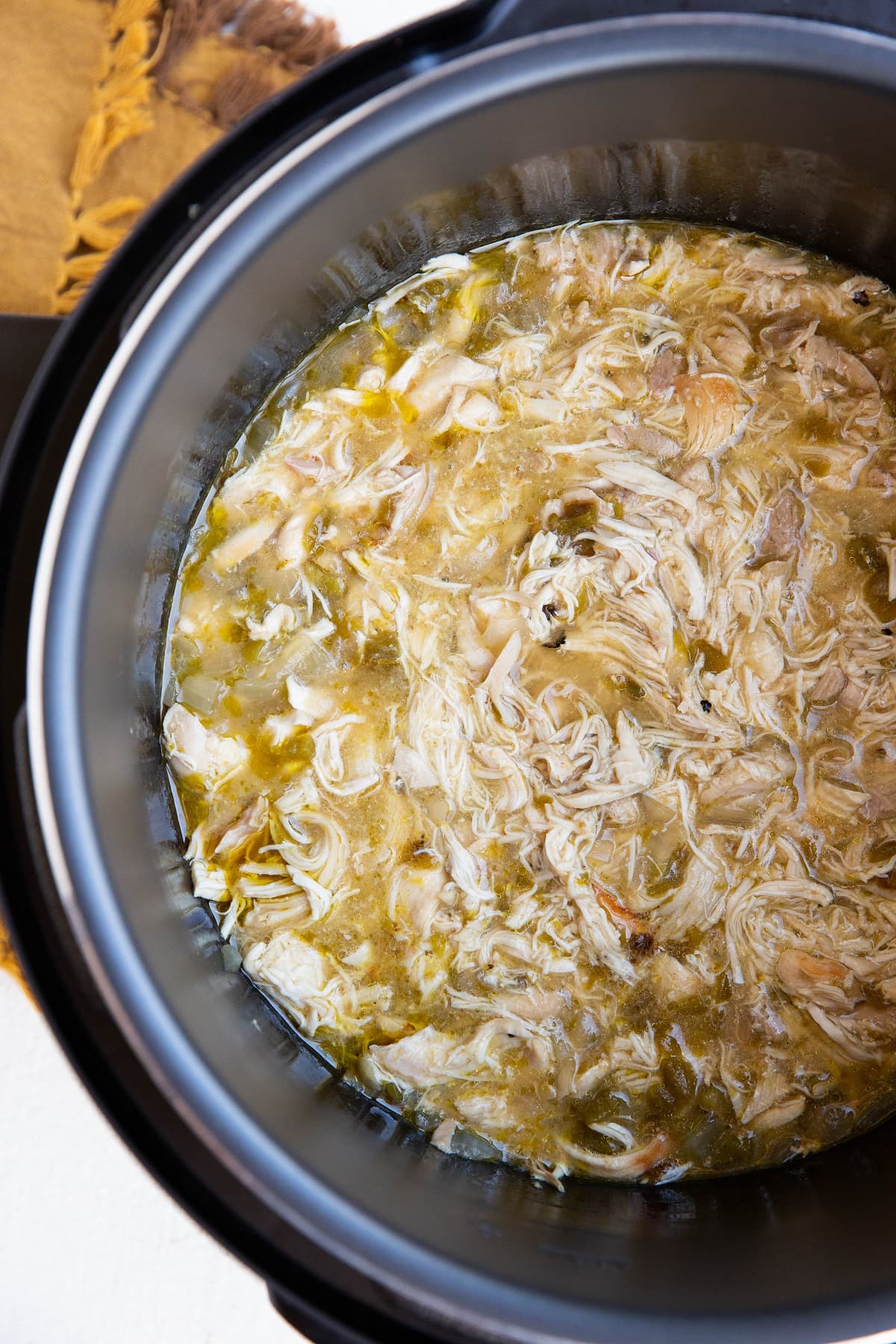 Instant Pot Shredded chicken recipe with green sauce.