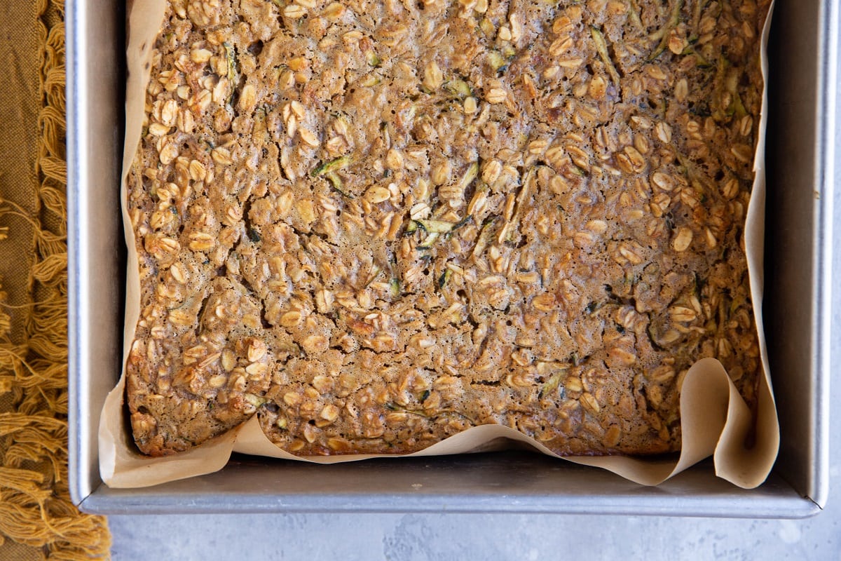 Zucchini baked oatmeal in a baking dish, fresh out of the oven.