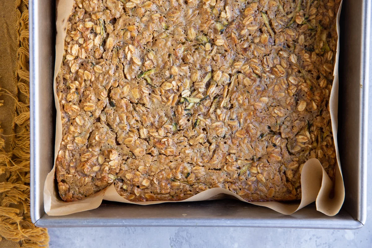 Zucchini baked oatmeal in a baking dish, fresh out of the oven.