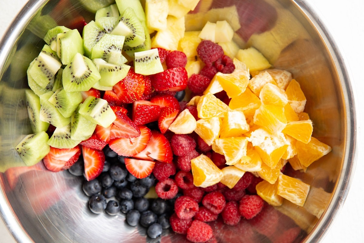 Fresh fruit in a large mixing bowl.