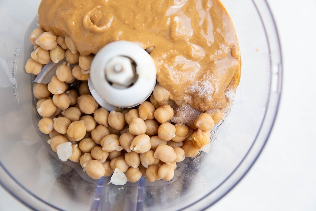 Chickpeas, peanut butter, pure maple syrup and salt in a food processor.