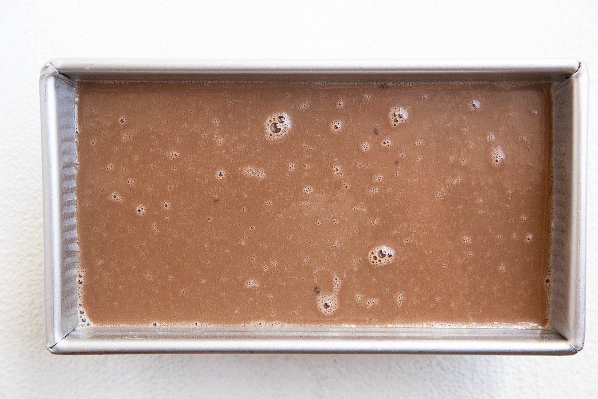 Chocolate ice cream base in a loaf pan.