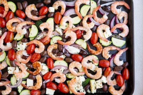 Veggies and shrimp on a sheet pan for a delicious one-pan meal.