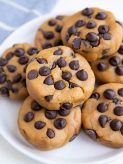 White plate of peanut butter chickpea cookies