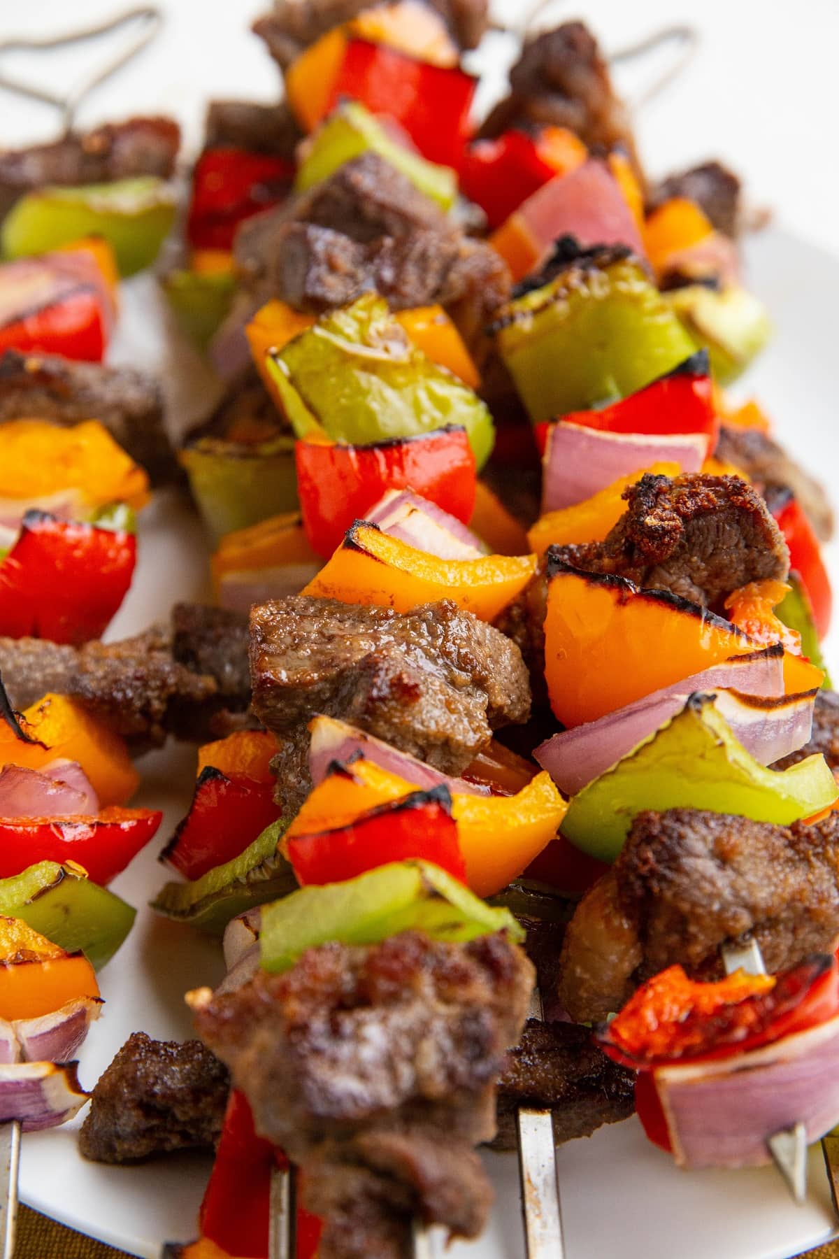 Stack of steak kabobs, ready to serve.