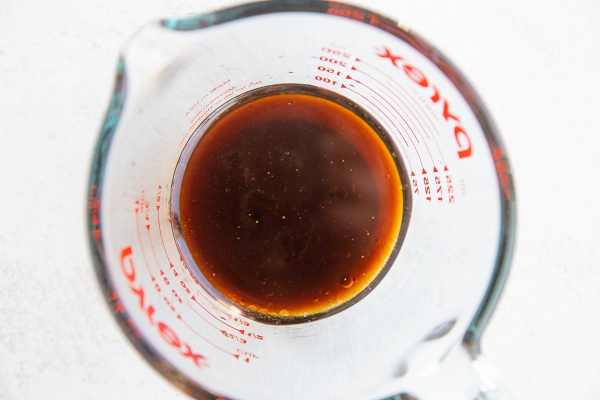 Ingredients for salmon marinade in a measuring cup, ready to be used.