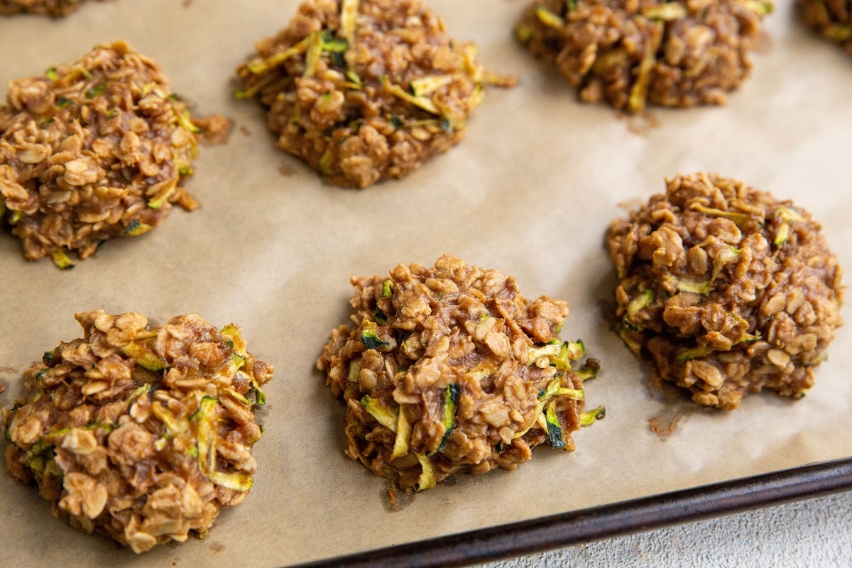 Baking sheet with oatmeal zucchini cookies fresh out of the oven.