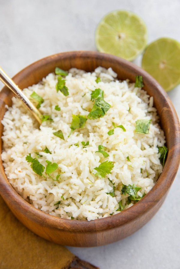 Wooden bowl of cilantro lime rice.