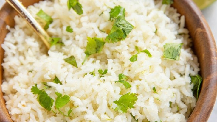 Wooden bowl of cilantro lime rice.