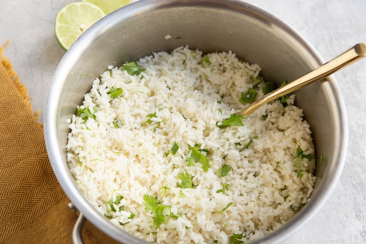 Cilantro lime rice in a pot, freshly made and ready to eat.