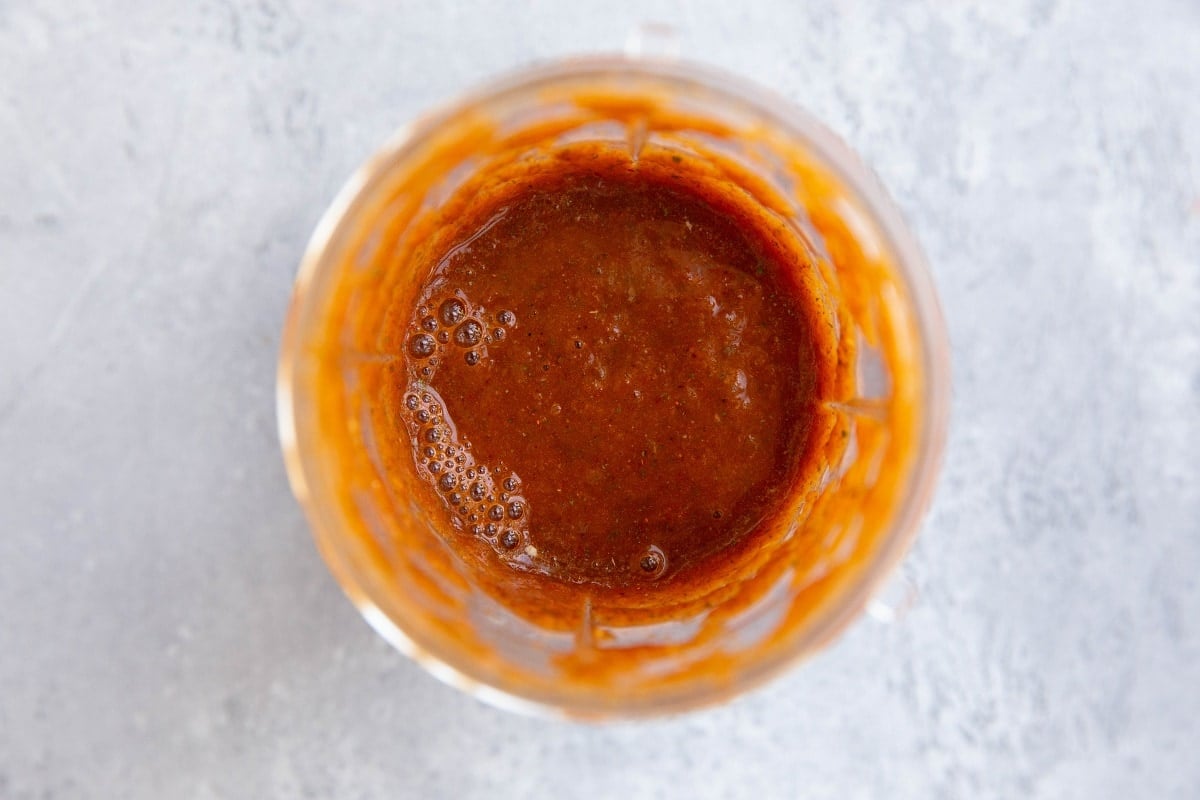 Blended chipotle marinade in a blender, ready to use.